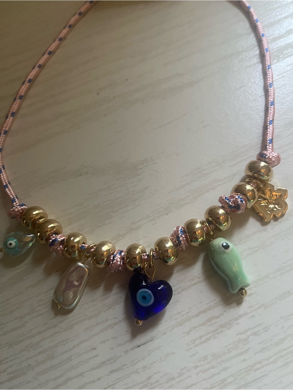 aerie Gold Bead Necklace with Pink Cord and Multicolored Glass  Charms